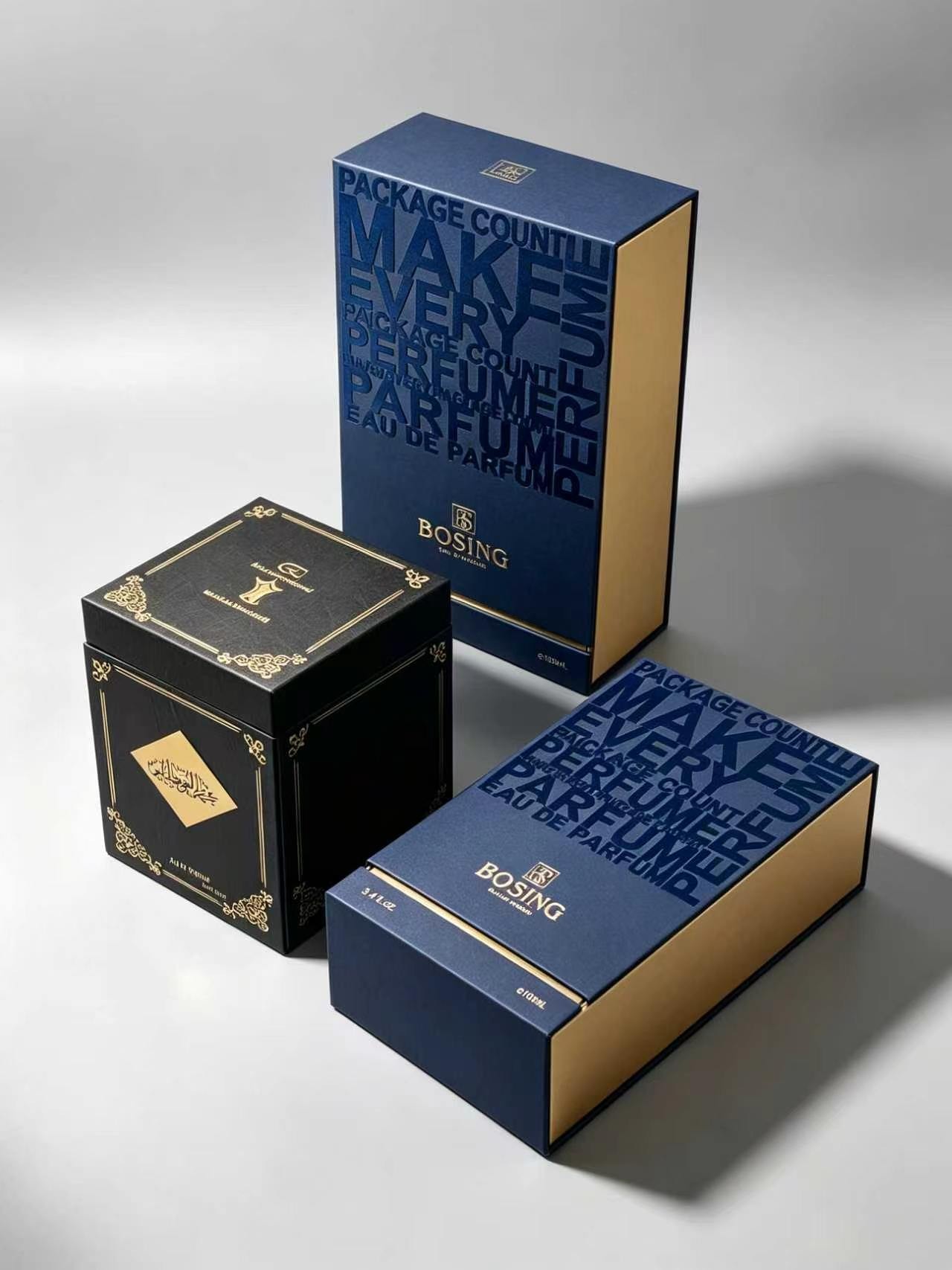 Modern Blue Typography Gift Box with Gold Inner Lining and Black Square Box with Arabic Calligraphy for Perfume Packaging