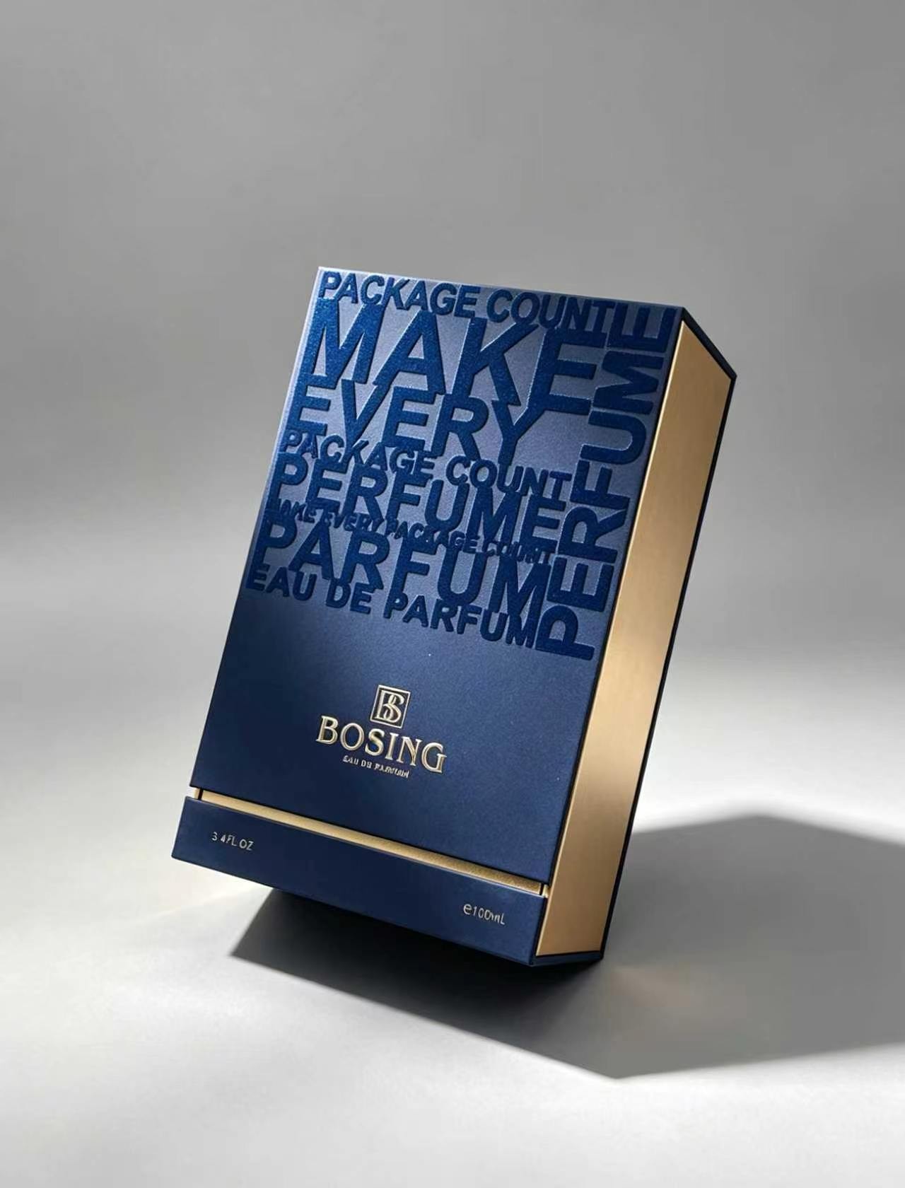 Modern Blue Typography Gift Box with Gold Inner Lining and Black Square Box with Arabic Calligraphy for Perfume Packaging