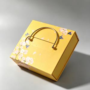 Yellow Portable Gift Box with Gold Metal Handle and Floral Butterfly Pattern for Cosmetic and Perfume Packaging