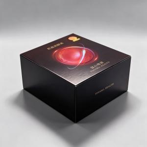 Matte Black Gift Box with Red Cosmic Sphere Design for Health Supplement Packaging